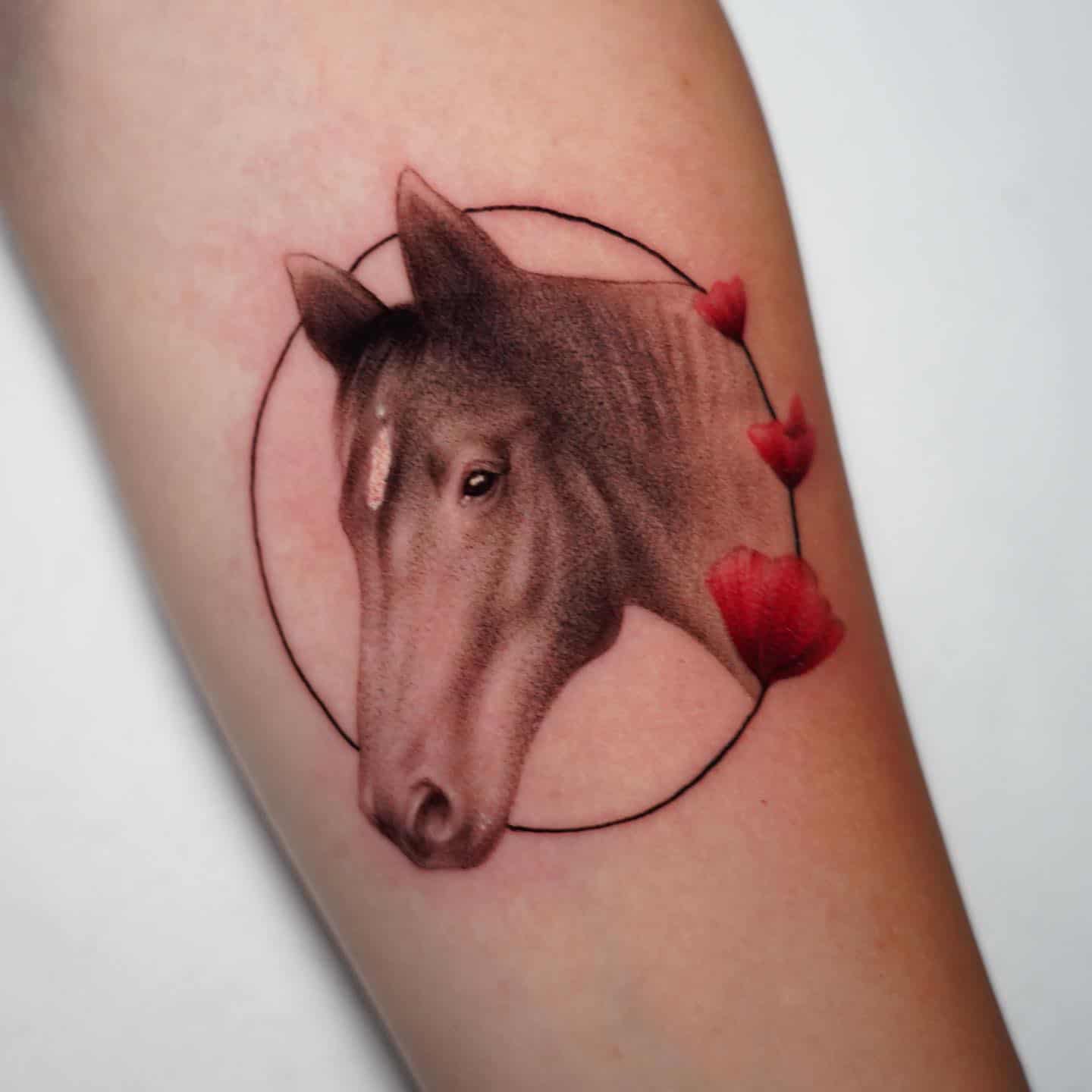 Horse with flower tattoo design by