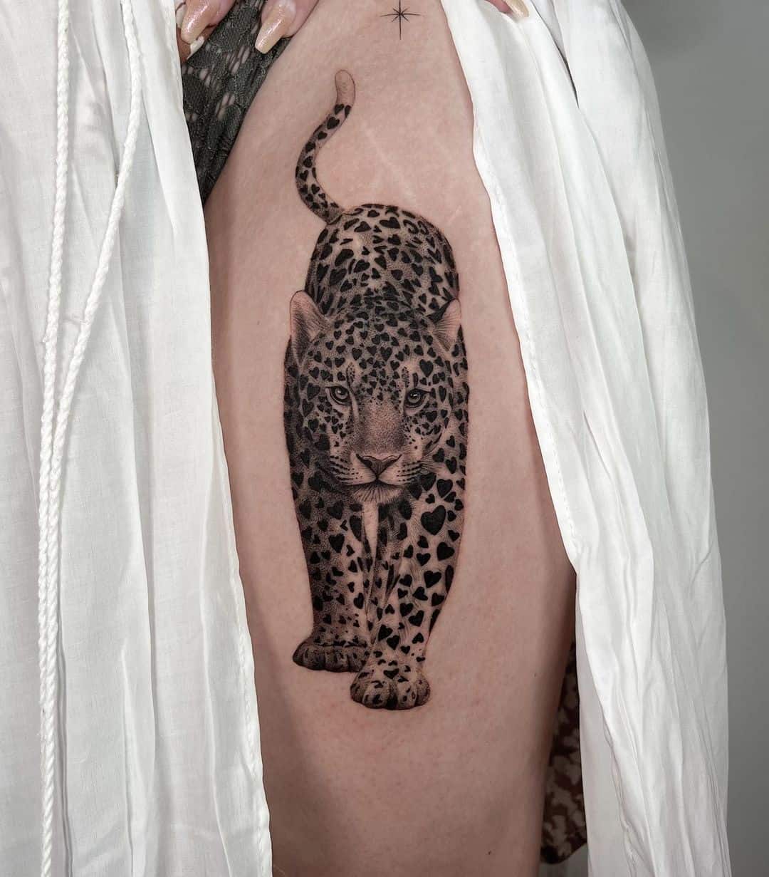 Leopard portrit tattoo by okeanos.tattoo