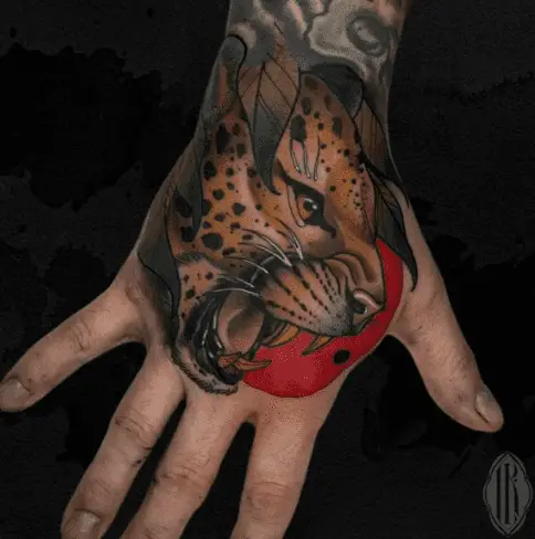 Leopard tattoo on hand by jsammut87