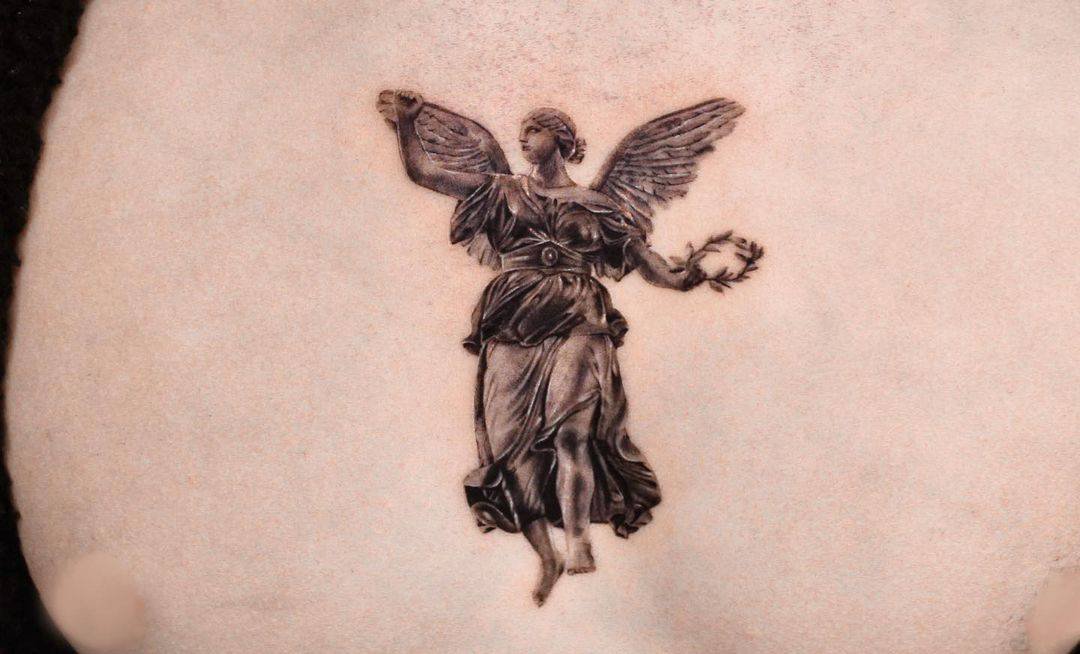 Micro Realistic greek god tattoo by redhaare