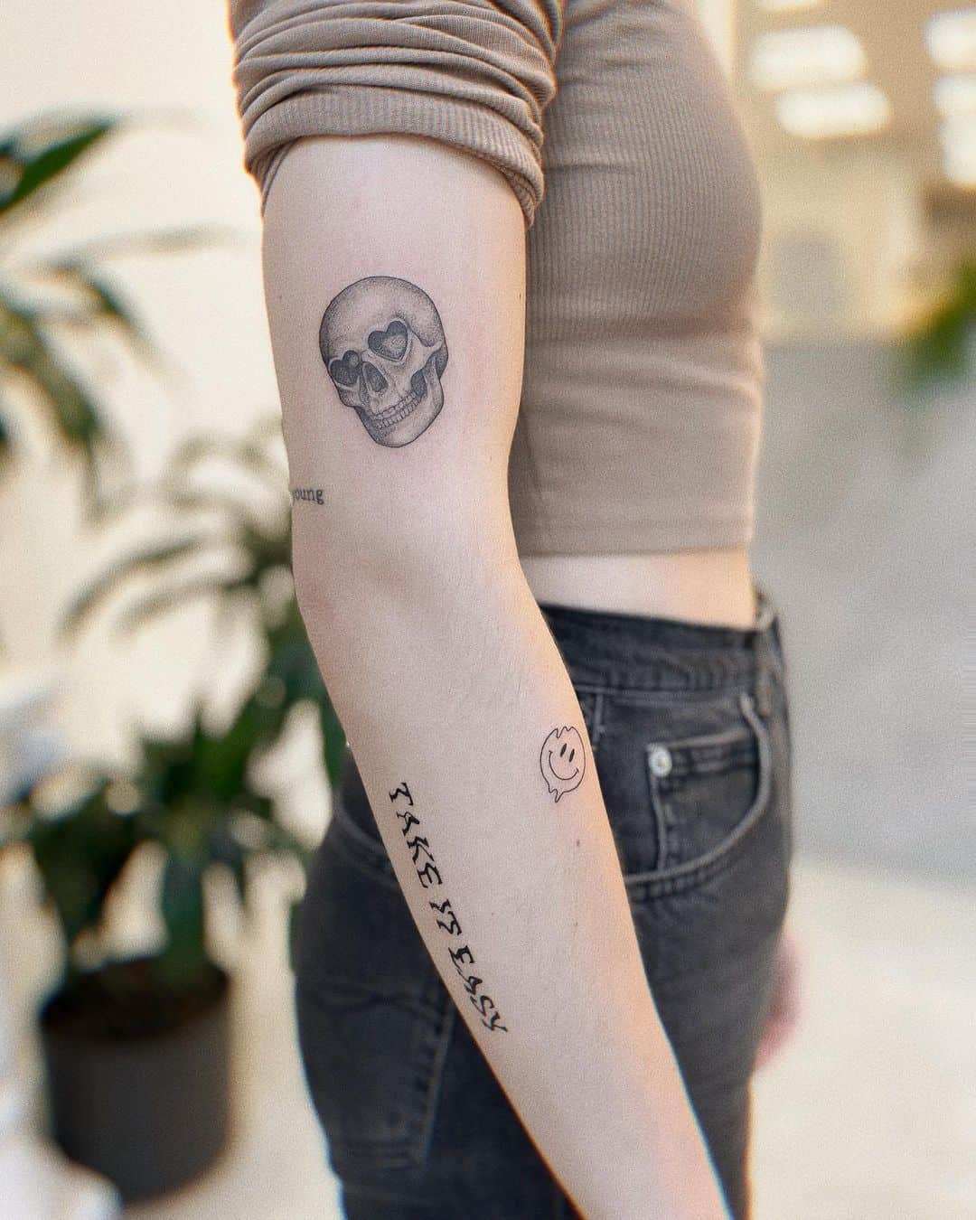 Micro realism skull tattoo by domaradzka.ink