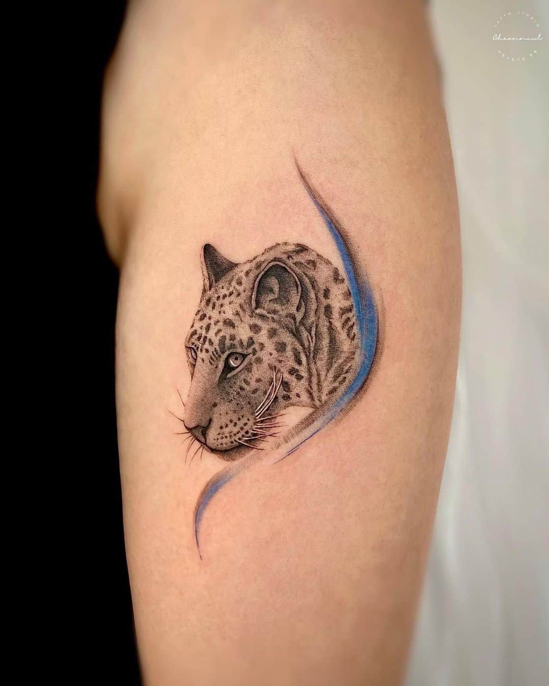 Realistic small leopard tattoo by tattooist neul
