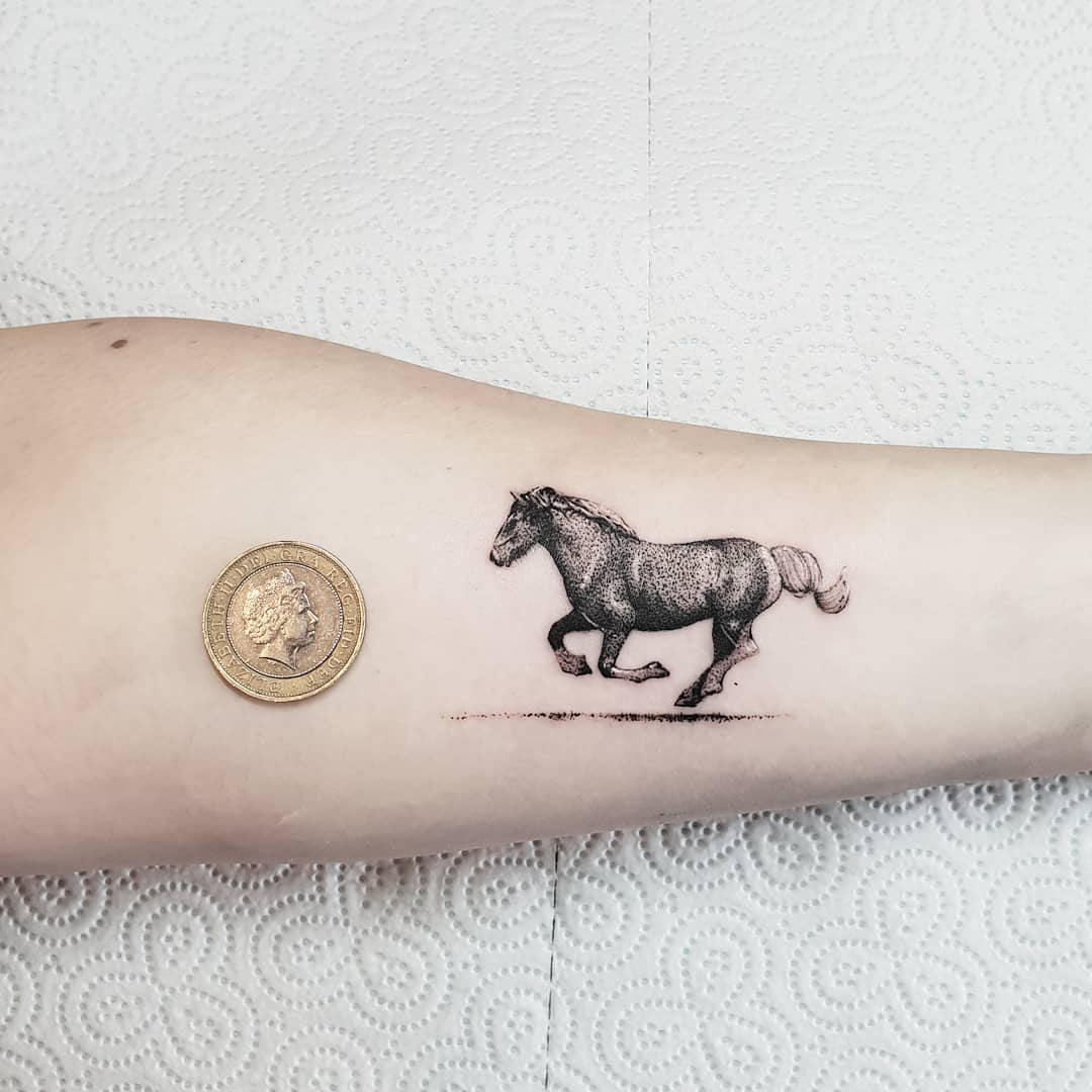 Running horse tattoo on arm by leehumphs tattooer
