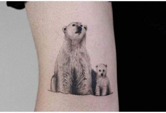 Little Tattoos — Small polar bear tattoo on the right inner ankle....