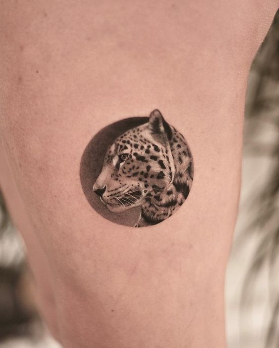 Small leopard tattoo