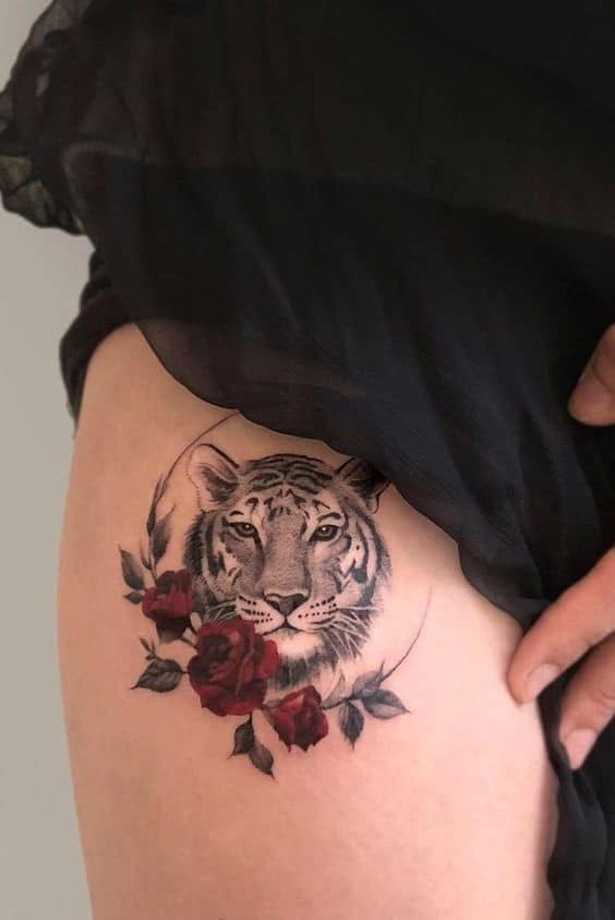 Tiger with rose on thigh