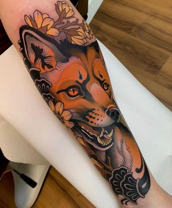 Traditional fox tattoo design on arm