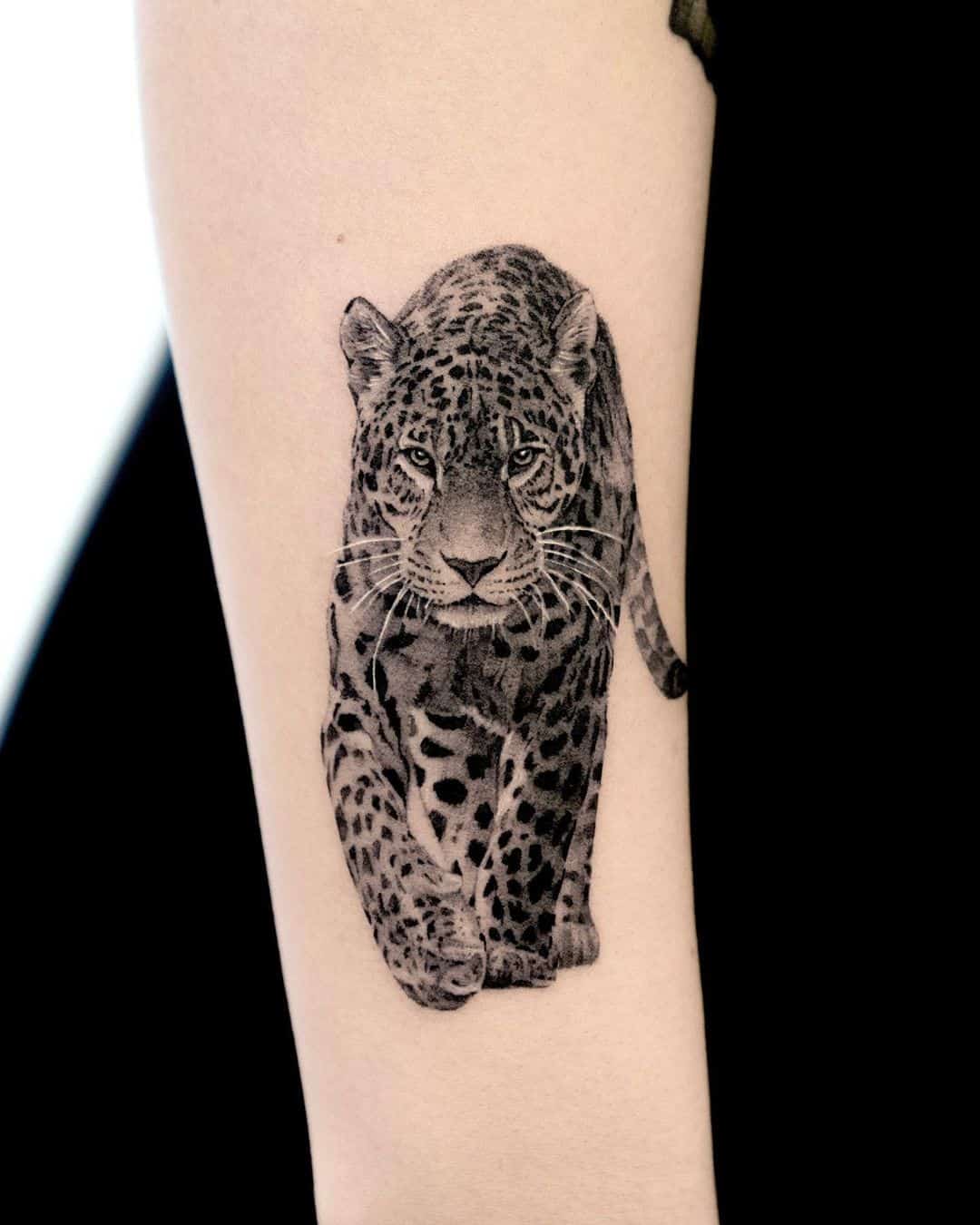 Wonderful leopard tattoo by start.your .line