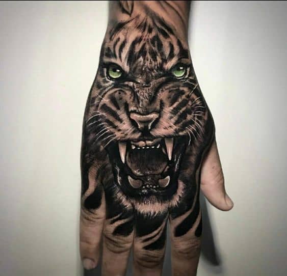 Wonderful tiger tattoo on hand