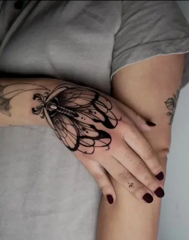 Amazing moth tattoo by marinalatre
