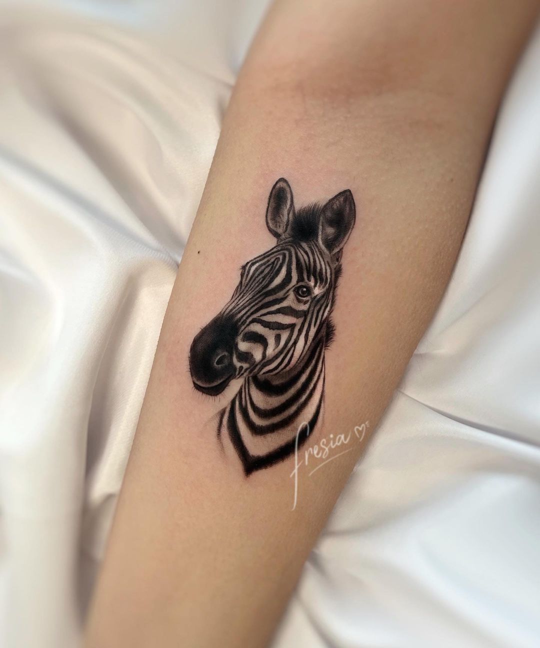 Amazing zebra portrait tattoo by fresia.tattoo