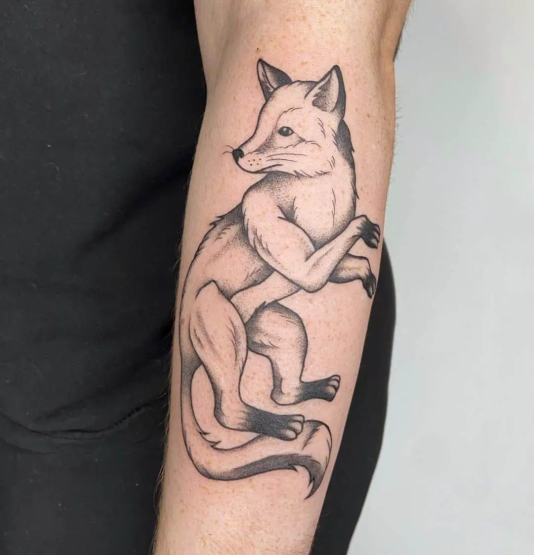 Black and gray fox tattoo on lower arm by jenna.boleyn