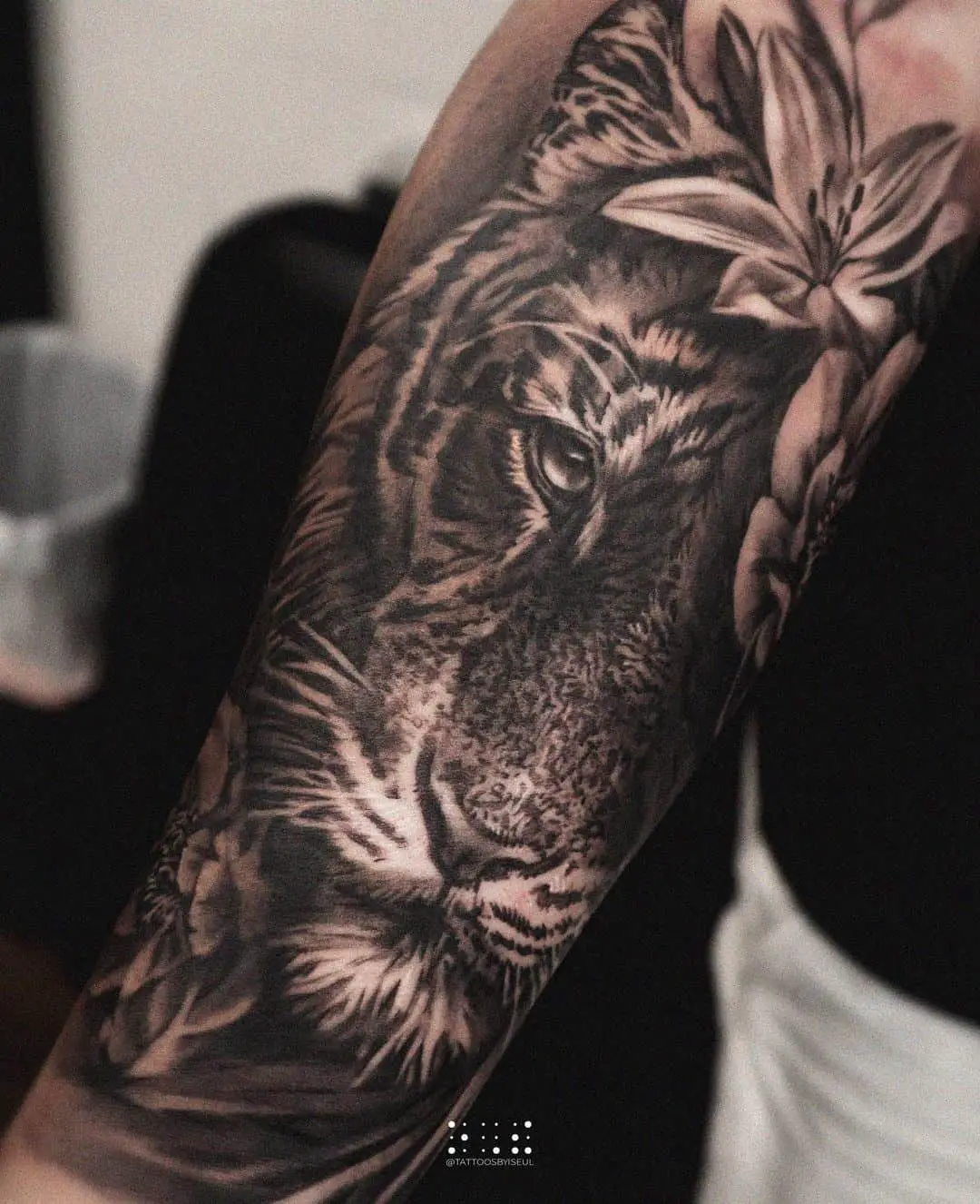 Black and gray tiger tattoo by tattoosbyiseul