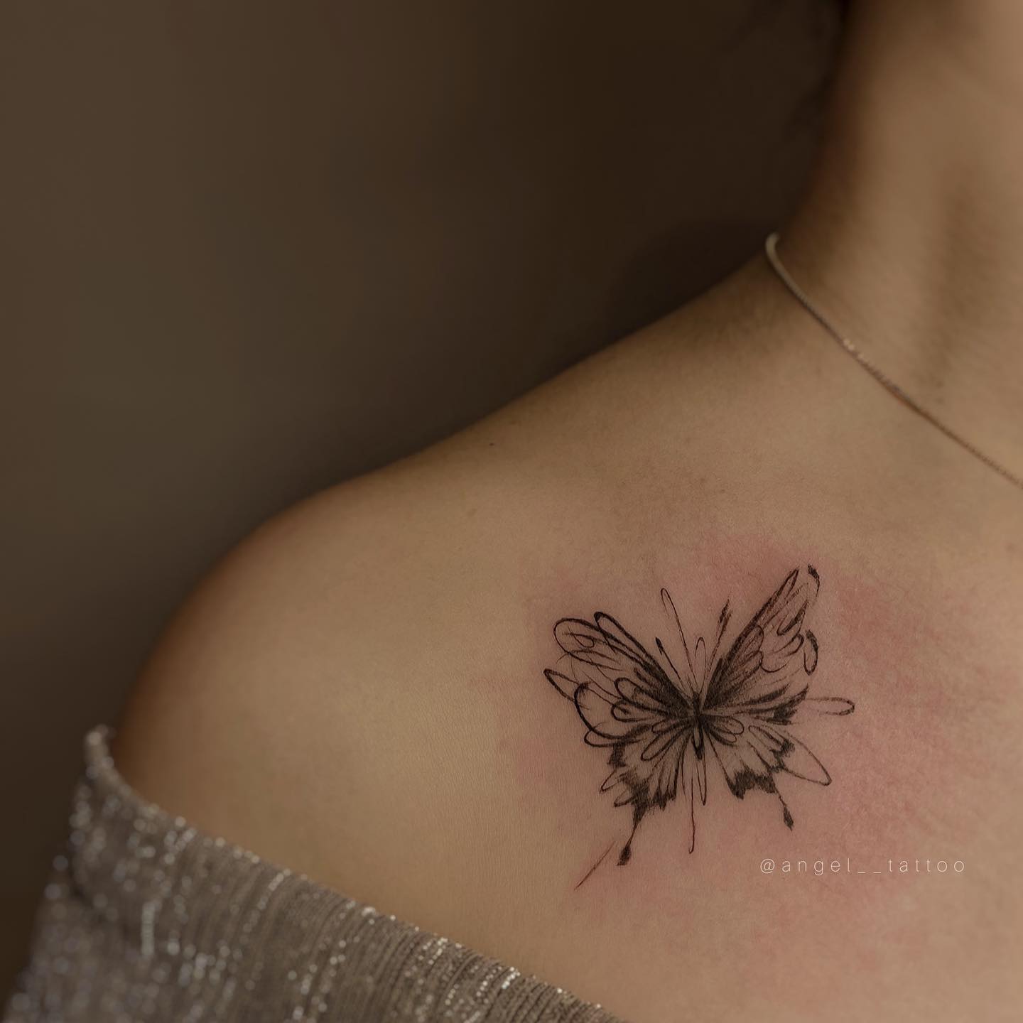 Butterfly tattoo by angel tattoo