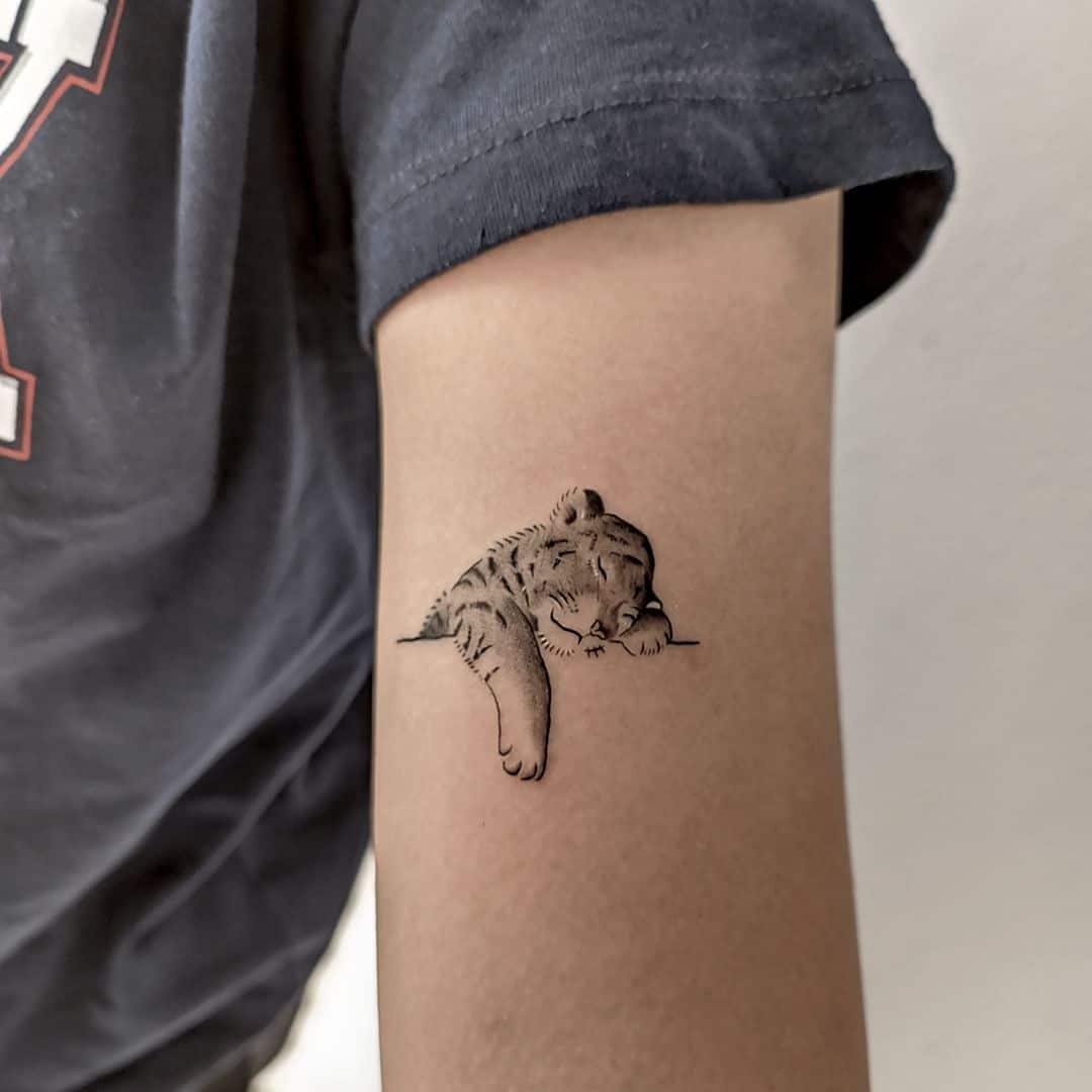 Cute tiger tattoo design by inkfever