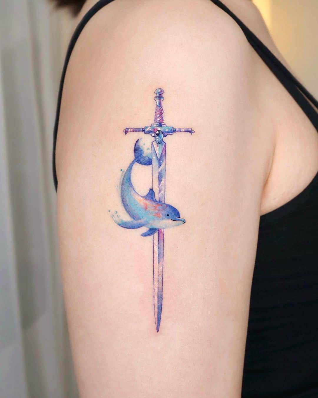 Dolphin tattoo by eunyutattoo