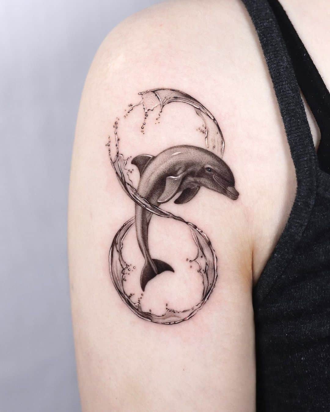 Dolphin tattoo by start.your .line