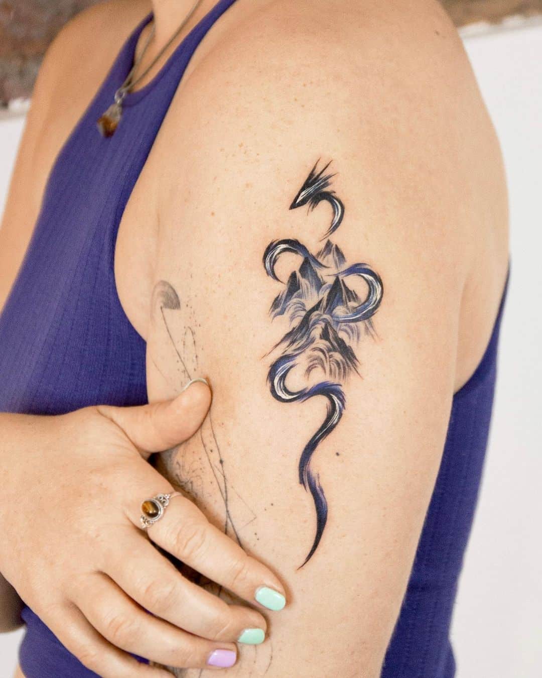 Dragon tattoo by tattooist zela