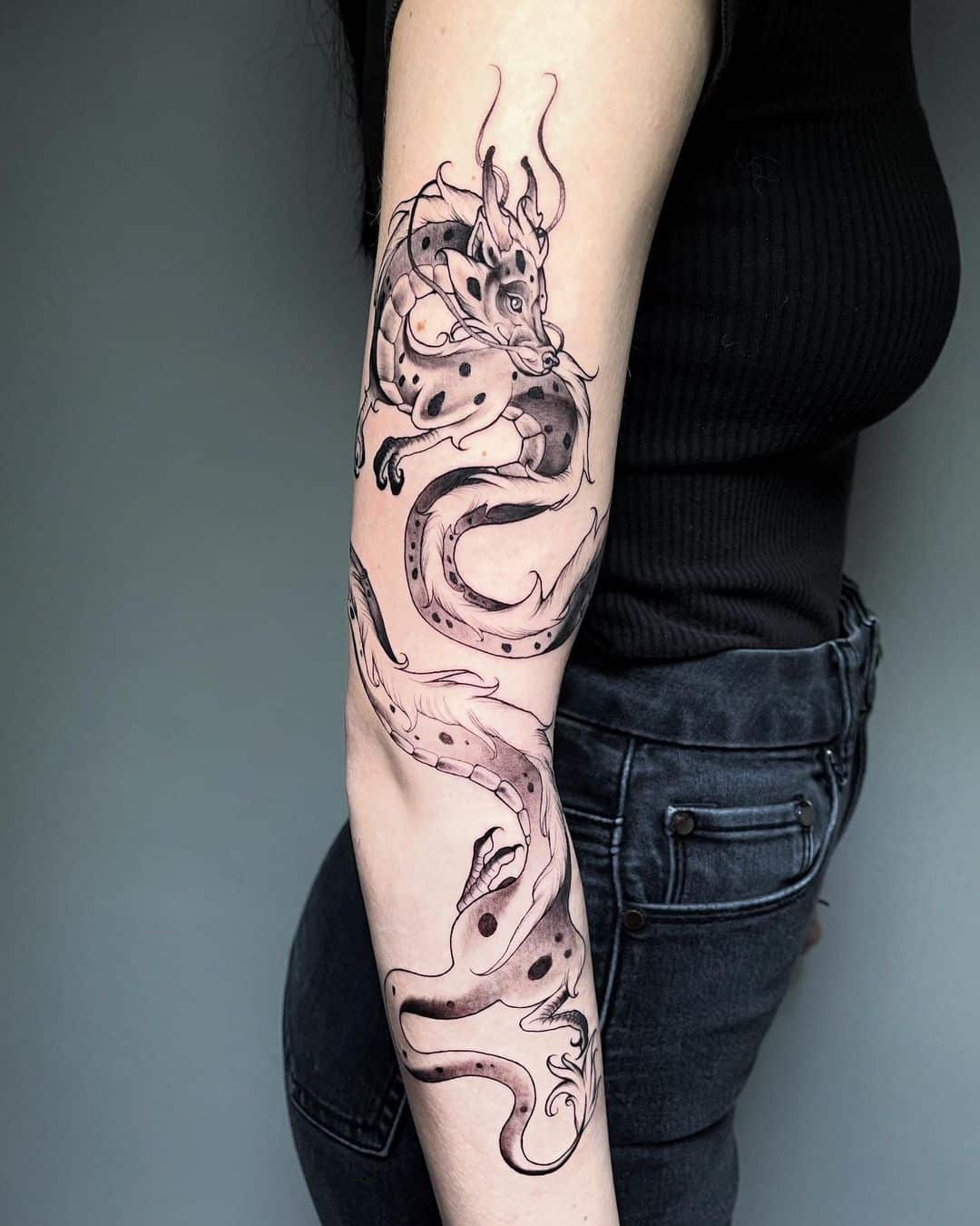 Dragon tattoo by teosink tattoo