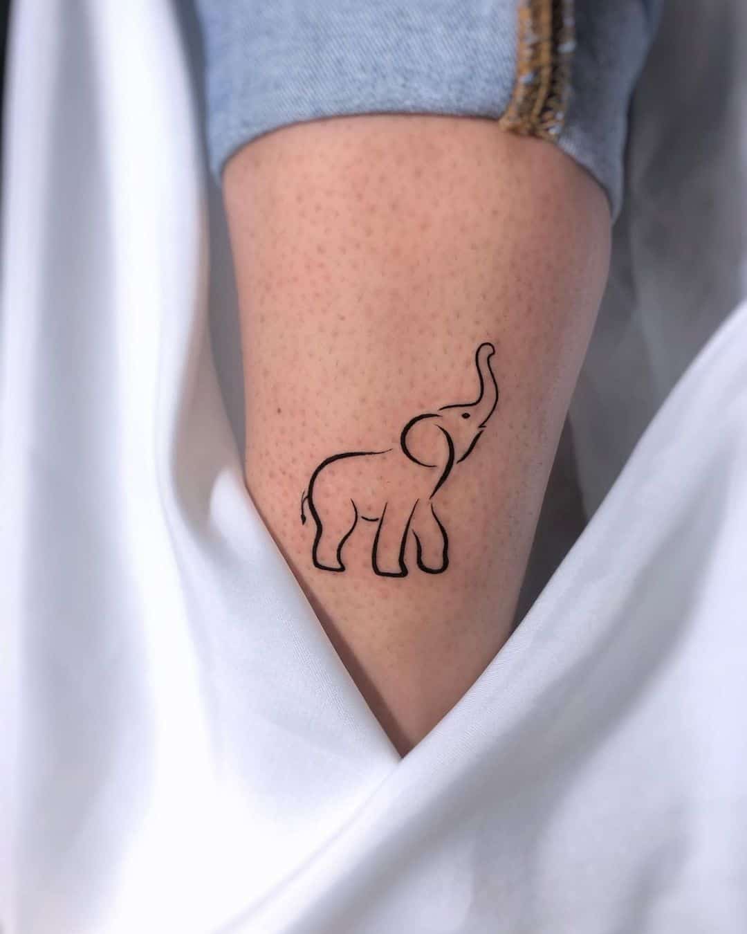 Elephant tattoo by nacatattoo