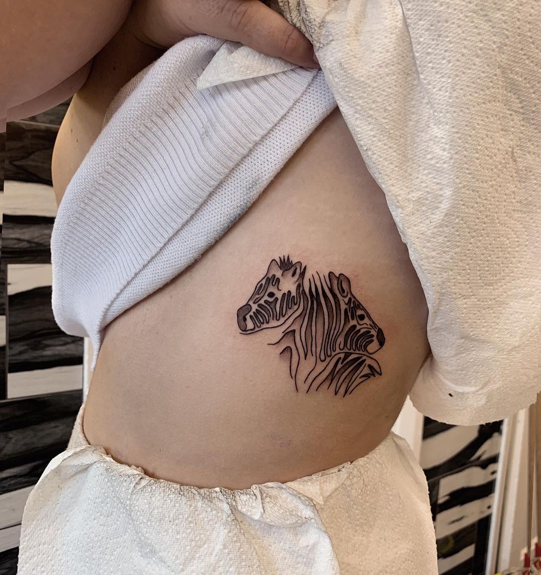 Fineline zebra tattoo by tattsbybetts