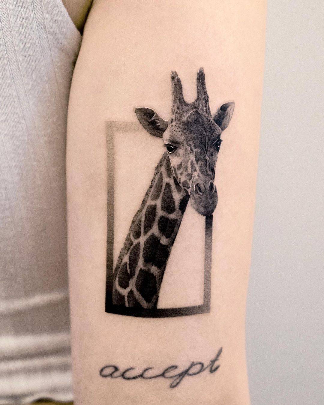 micro realism giraffe portrait for Sarah 🦒 made at: @aquatica_tattoo . . .  . . . . . #tattoo #giraffetattoo #giraffe #stamptattoo #... | Instagram