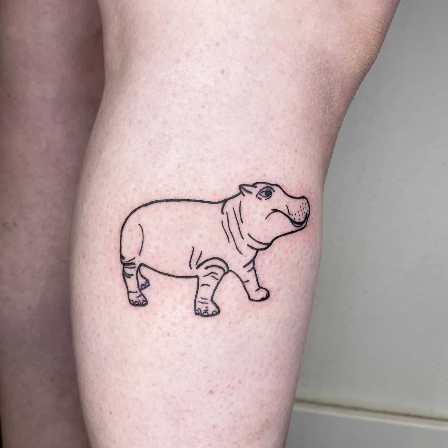 Hippo tattoo by hey maks tattoo