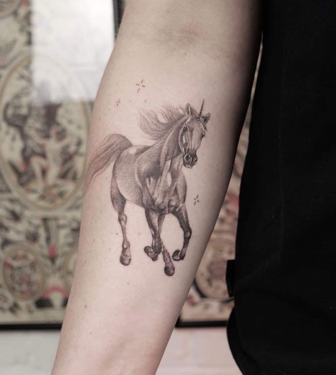 Horse tattoo by kia ora tattoo