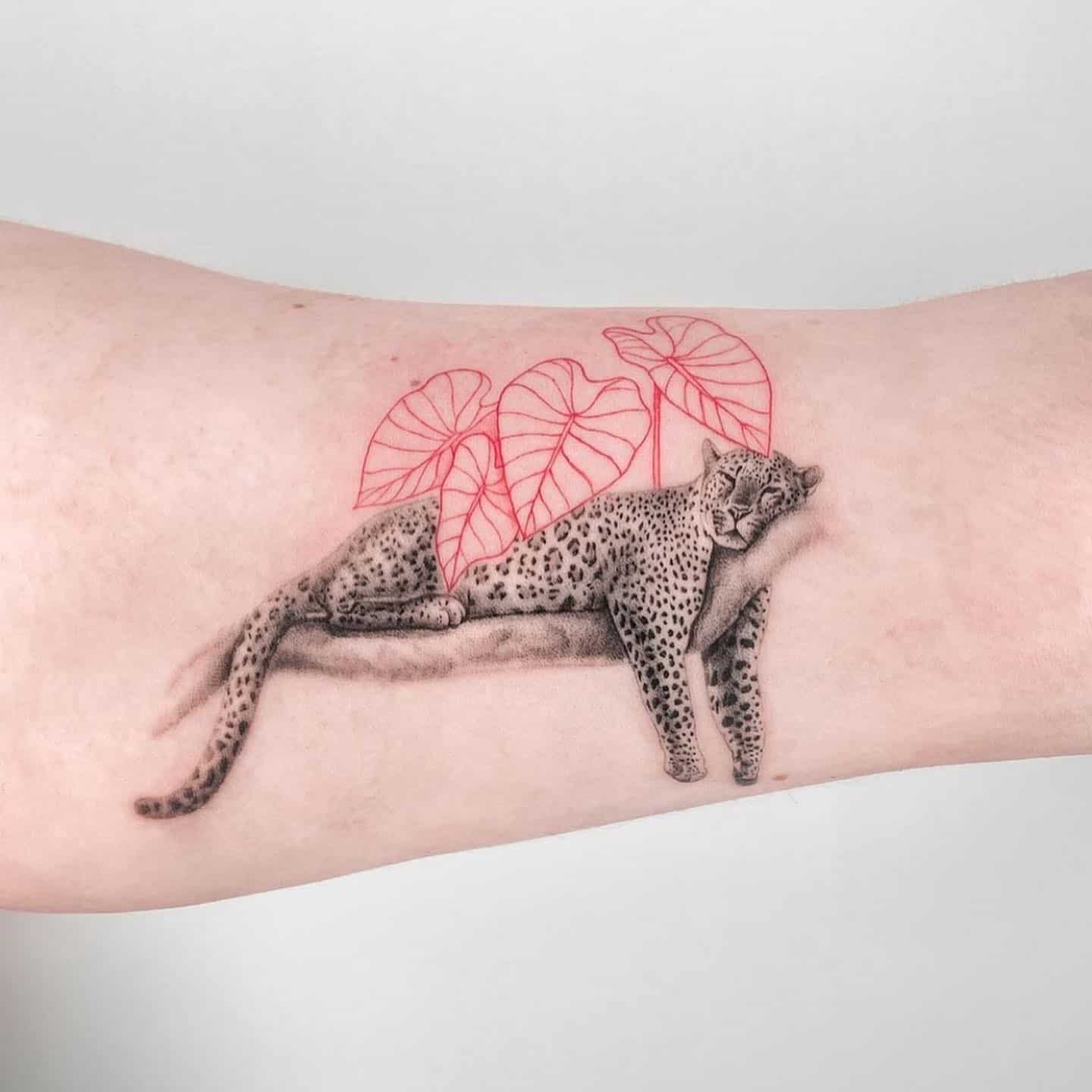 Leopard tattoo by lemontreaink
