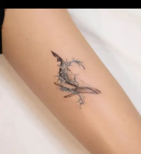 Minimalistic whale tattoo 1