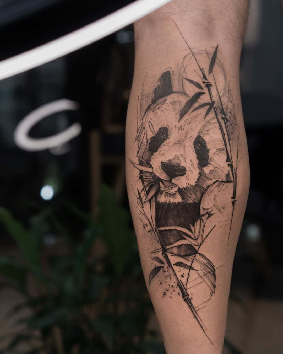 Panda tattoo by