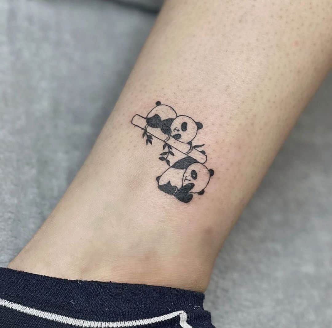 Panda tattoo by zeetattooo