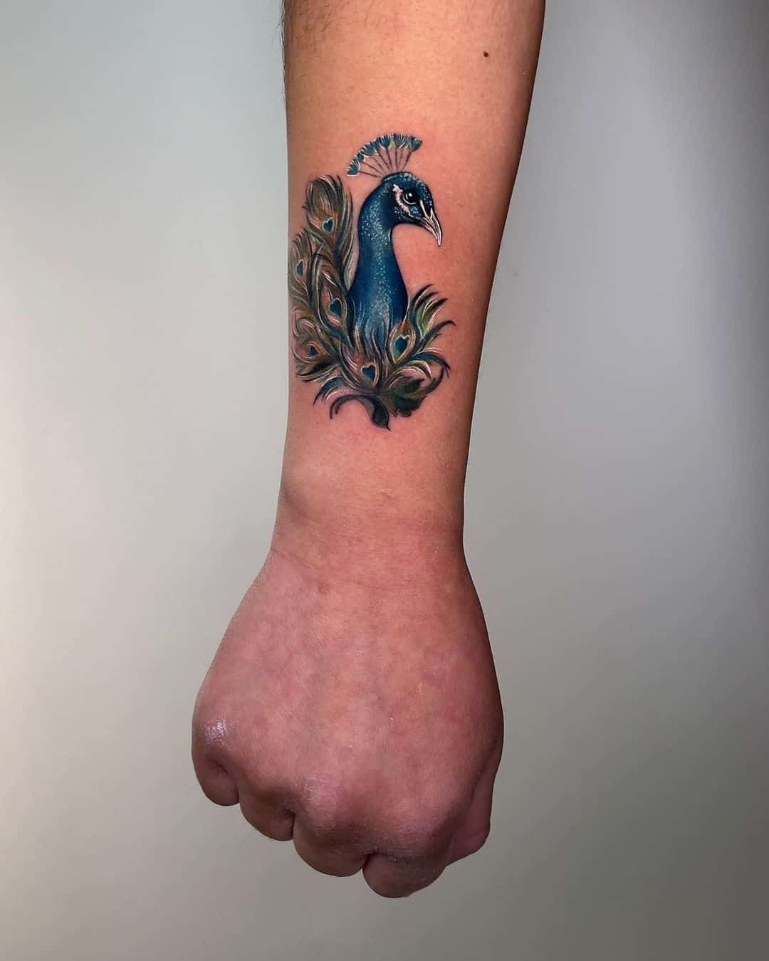 Peacock tattoo by getsytorres
