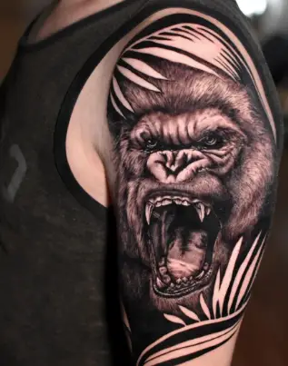 Realistic chimpanzee tattoo by messer tattooer