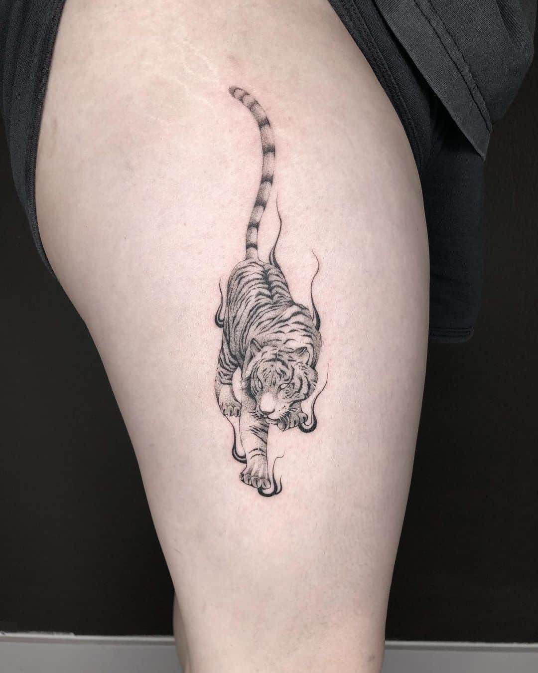 Realistic tiger tattoo by logan artstudio