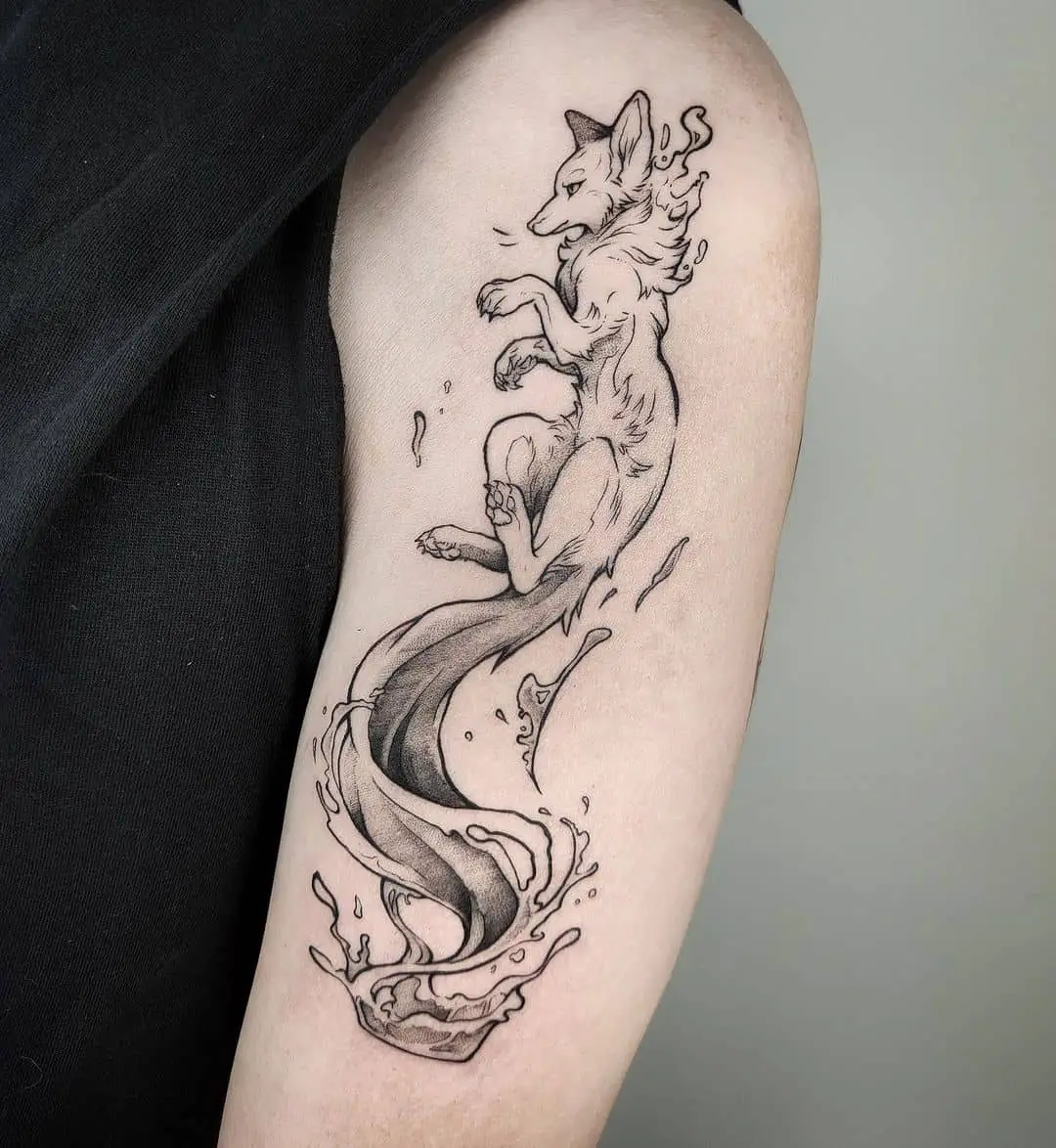 Simple fox tattoo design on upper arm by macy.tattoo