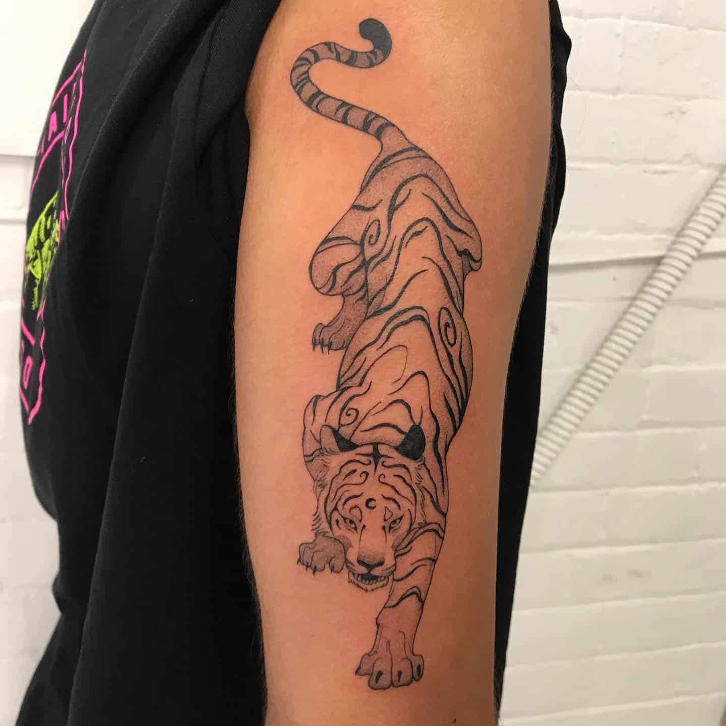 Simple tiger tattoo by kiratheoddist