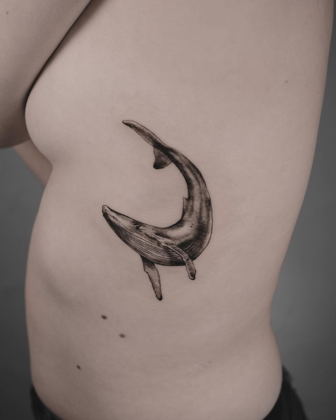 Simple whale tattoo by juliafritztattoo