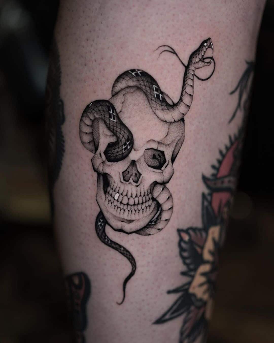 Snake tattoo by garztattoos