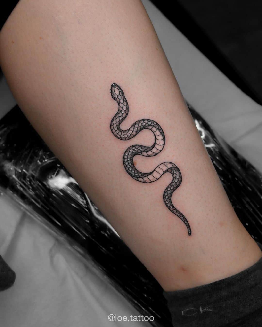 Snake tattoo by loe.tattoo