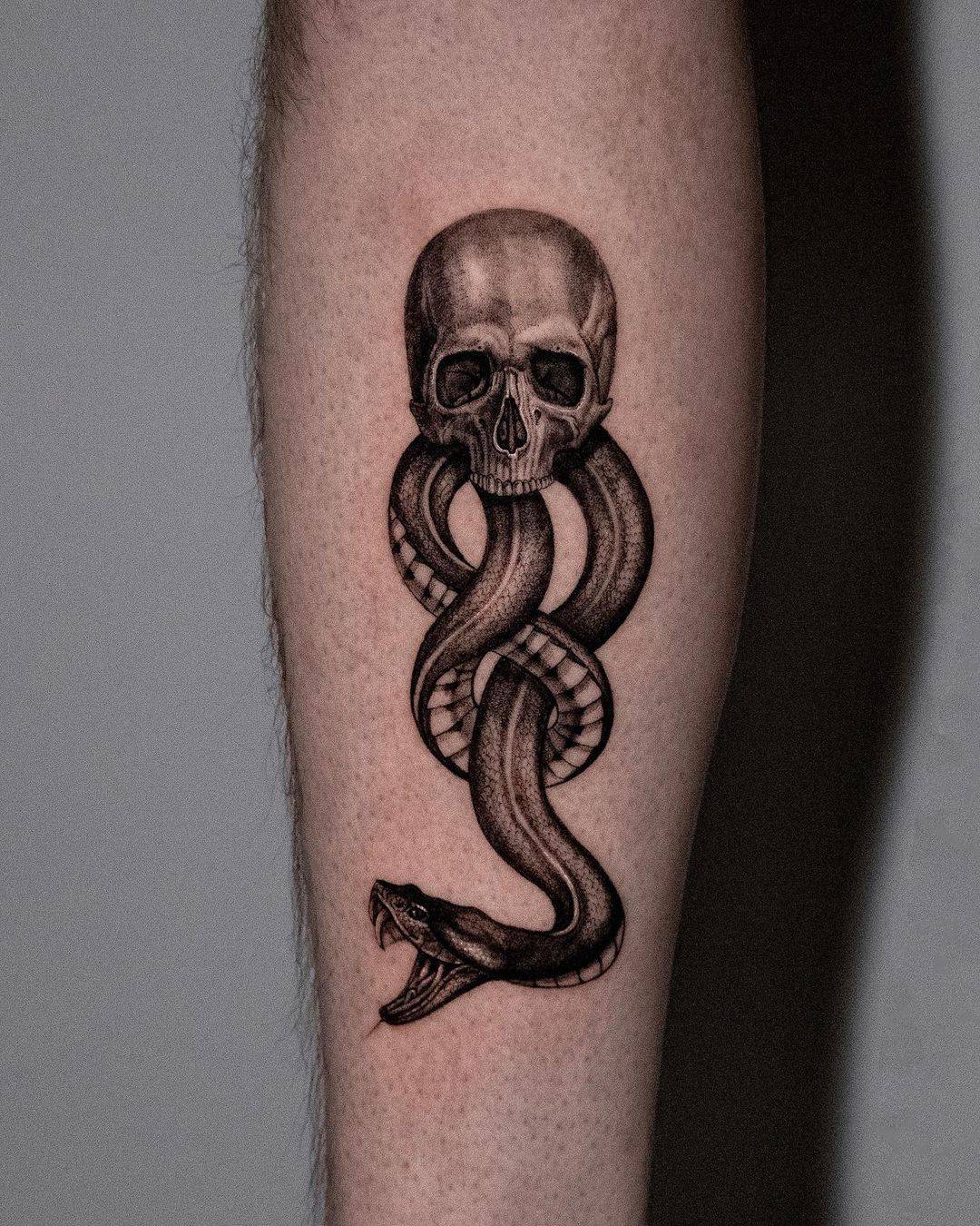 Snake tattoo by ygtattoos