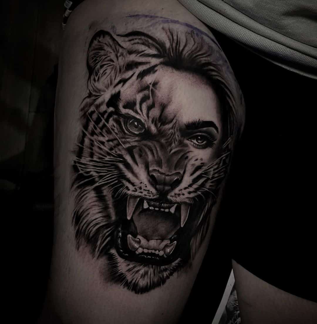 Tiger face tattoo by mbta tattoo
