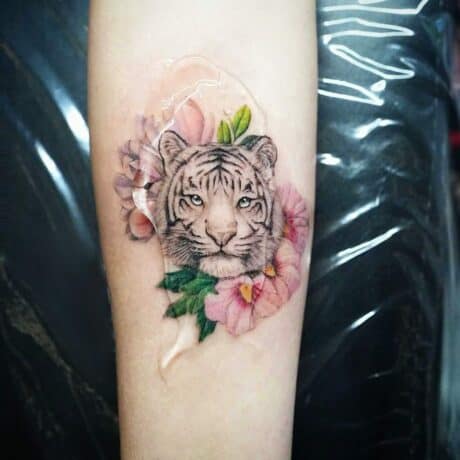12 Best Tiger and Flower Tattoo Designs  PetPress  Flower tattoo  shoulder Tattoo designs Flower tattoo