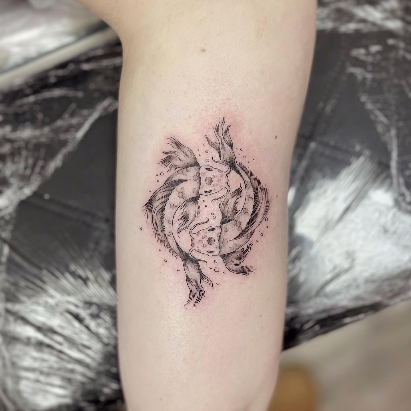 Two fish tattoo by tattoohandy