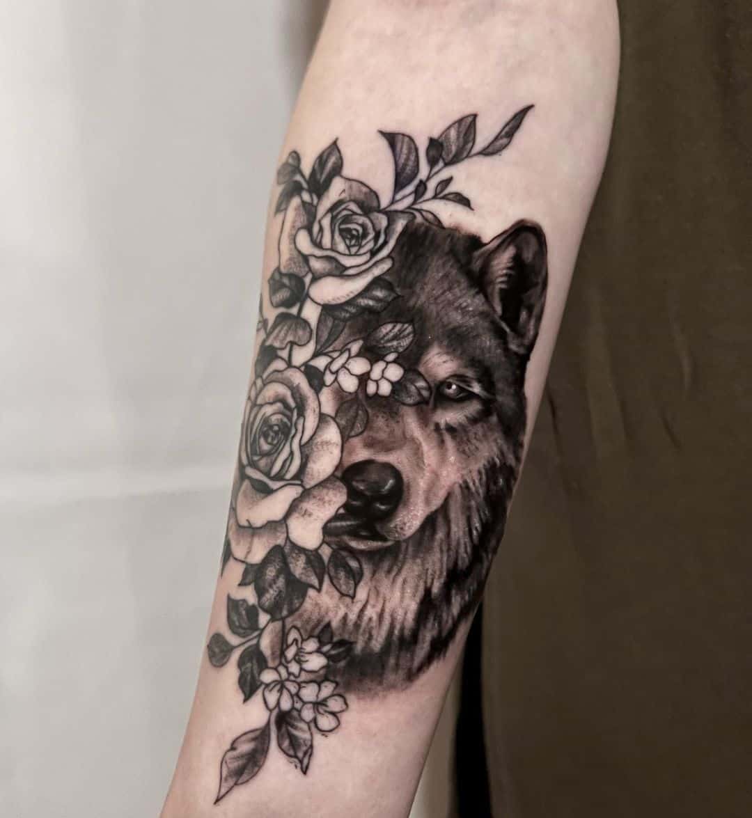 Wolf tattoo by ratbitetattoo