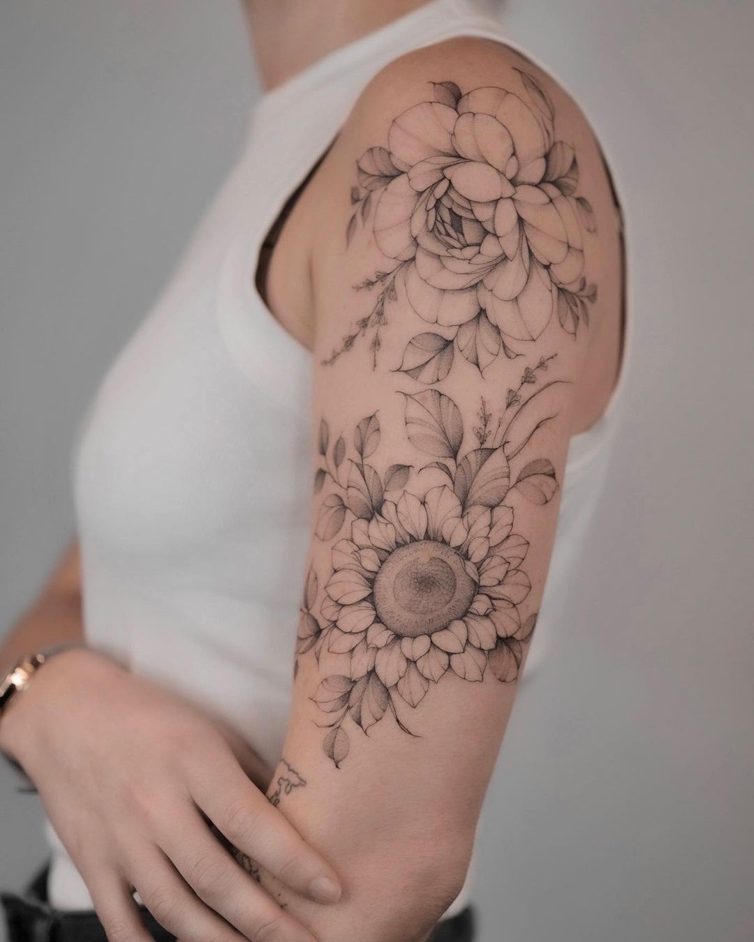 Black and grey sunflower tattoo by asya.tattoo
