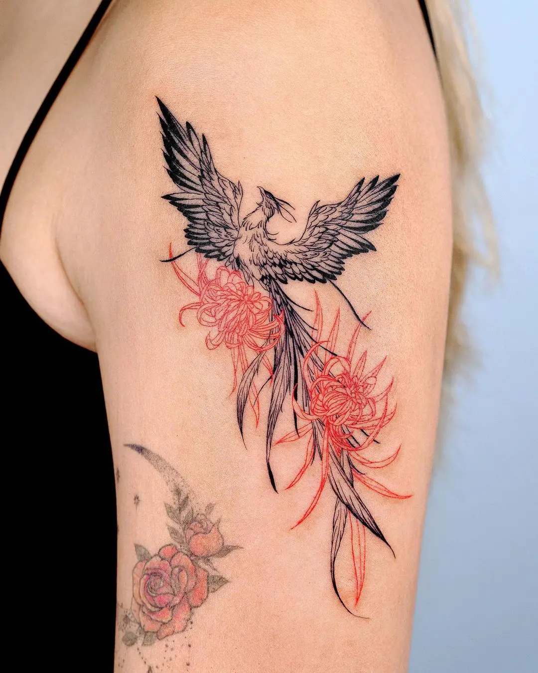 Black phoenix tattoo by bium tattoo