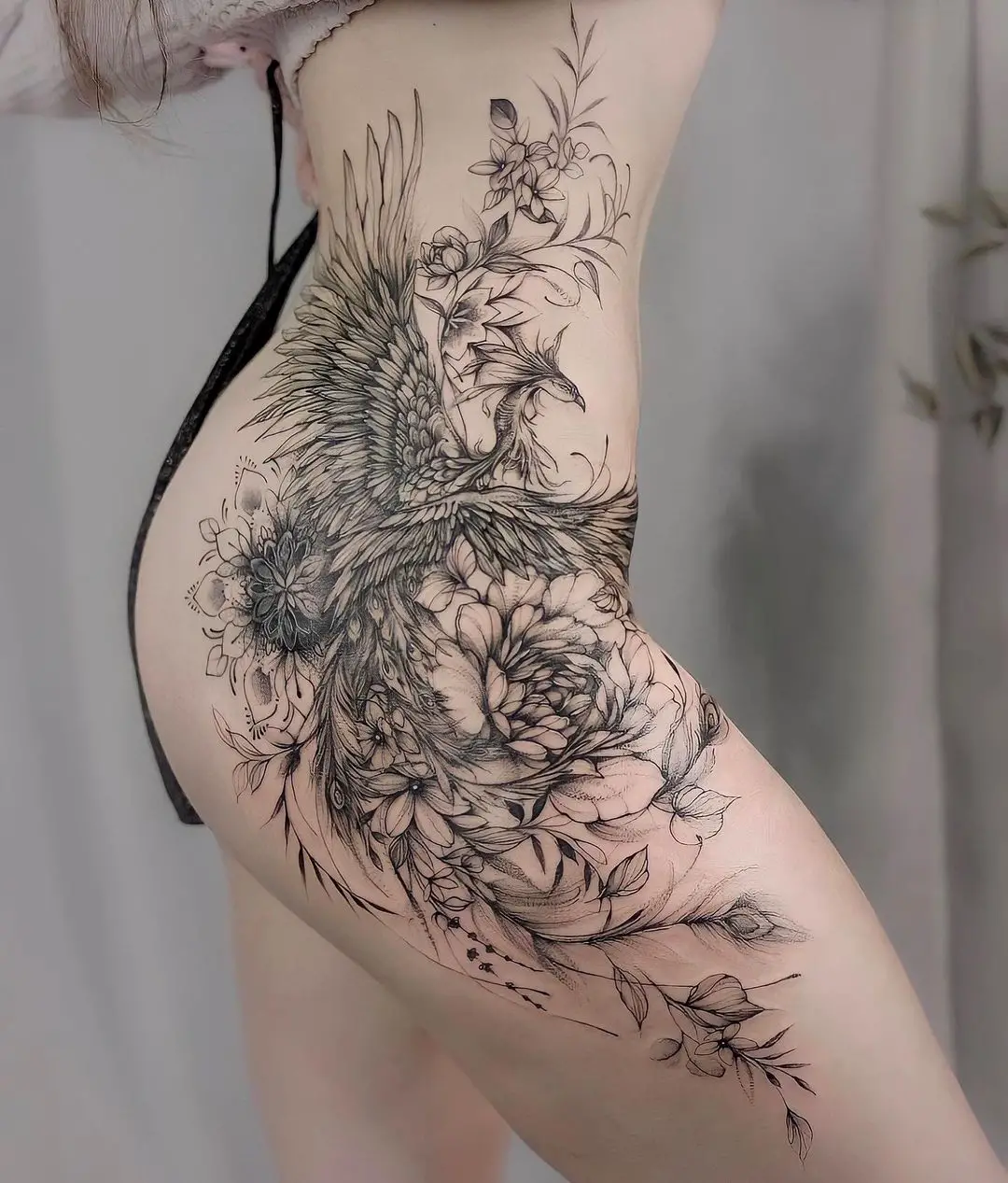 Black phoenix tattoo by goldeniron tattoos toronto