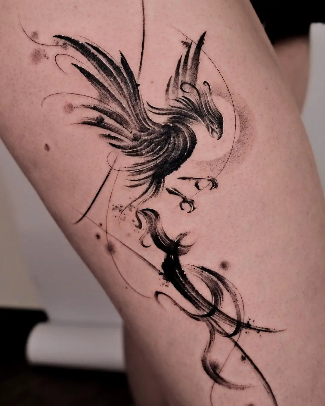 Black phoenix tattoo by tattooist jaymee