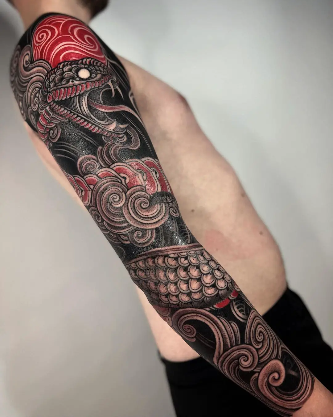 Black snake tattoo by rainmundo ramirez